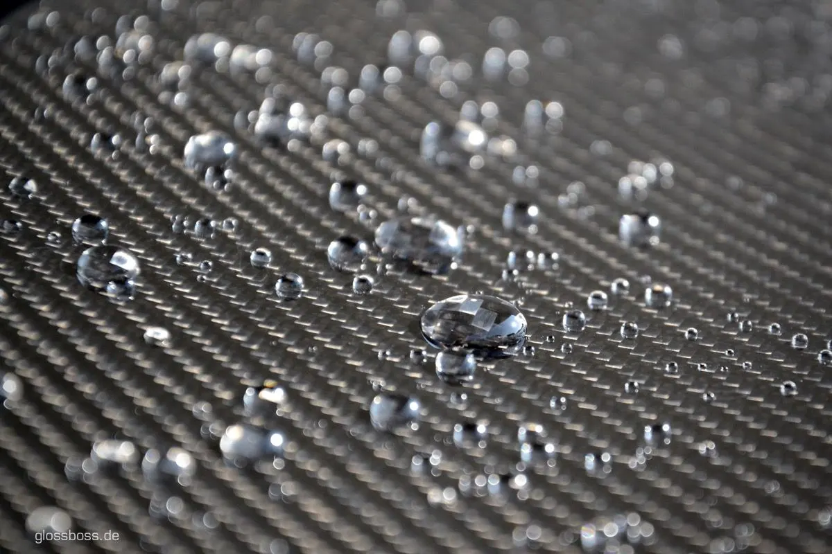 Water beading on a freshly sealed carbon fiber panel