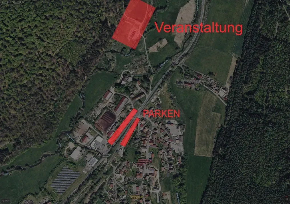 Luftbild mit Veranstaltungsgelände oben und den Parkflächen an der Hauptstraße